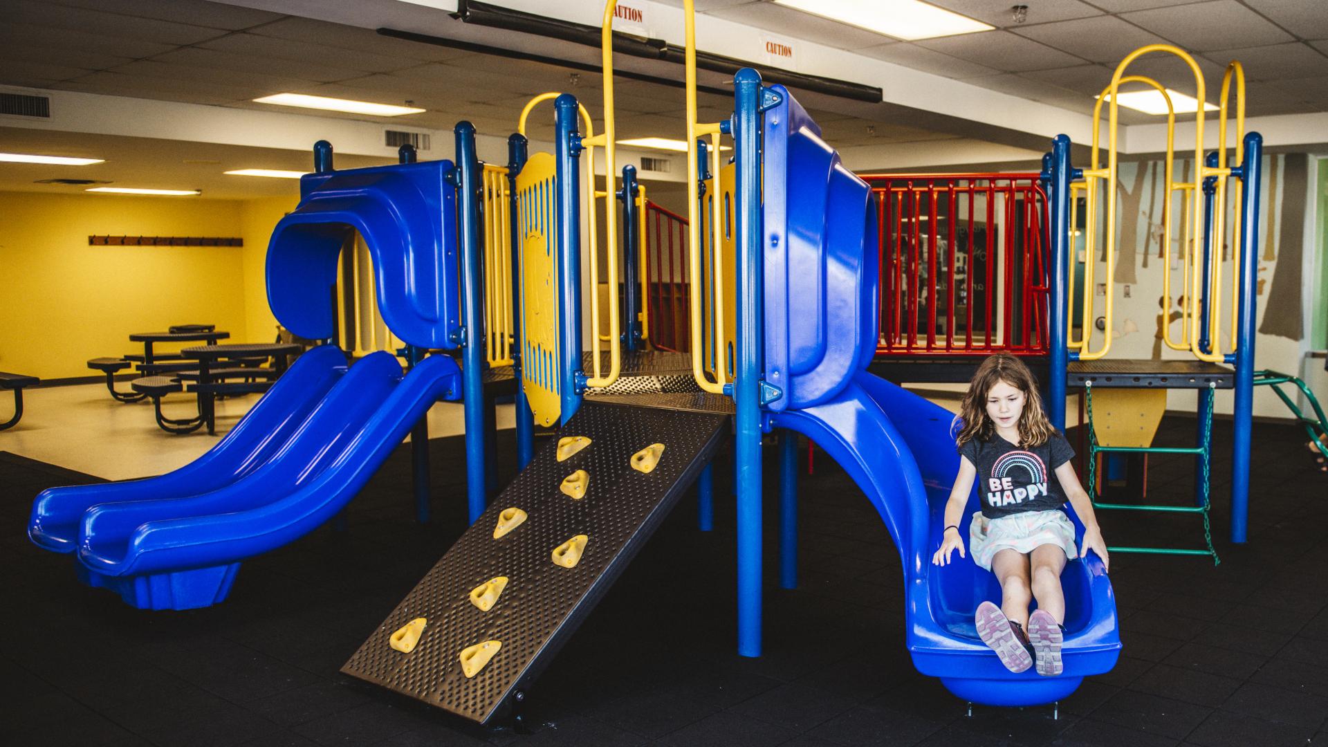 Indoor playground with child in photo