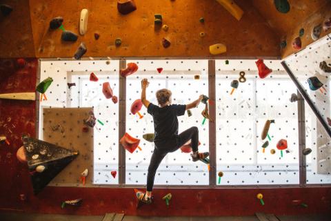 A kid on the Yellowknife Climbing Wall